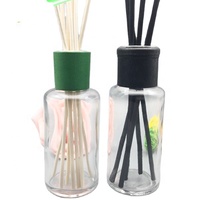 Bouteilles en verre de diffuseur rondes de 100ml à vendre Bouteille vide de diffuseur de roseau d'arôme avec le chapeau et le bouchon