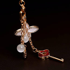 2025 Nueva fábrica al por mayor Moonlight Stone Tulip Car Girl Cute Bag colgante pequeño regalo al por mayor llavero de diamante de Metal - Product Image 5