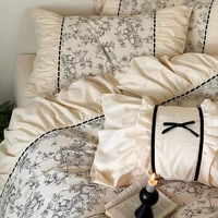 Ensemble de literie 6 pièces en polyester noir et blanc imprimé avec dentelle et nœuds, comprenant housse de couette, drap plat et drap-housse