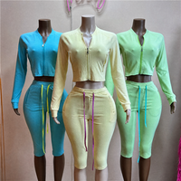 Ensemble 2 pièces color block tendance Jiubaju pour femme : veste à col rond et manches longues et pantalon capri à cordon de serrage