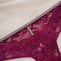 Vente en gros de culottes sexy en dentelle sans couture en forme de T pour femmes, confortables, taille basse, très élastiques, pour filles et femmes