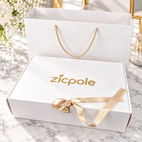 Boîte d'emballage en carton rigide de luxe sur mesure en gros et ensemble de sacs en papier avec ruban pour vêtements