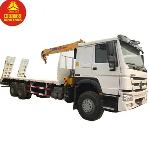 SINOTRUK HOWO LHD Cargo Truck With Flatbed Trailer Boom Crane Truck 10T Lifting Capacity