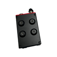 Lecteur de codes à barres bidimensionnels KEYENCE SR-2000W utilisé pour la lecture de codes sur plusieurs faces des boîtes en carton dans les lignes de tri