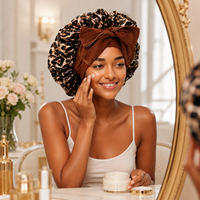 Bonnet en satin imprimé léopard avec nœud papillon et longue queue pour cheveux bouclés, tresses et cheveux naturels – Vente en gros pour femmes