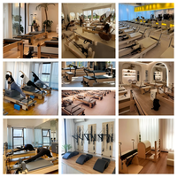 Private Label Premium Pilates Reformer mit Eichenholzrahmen und leisen Rollen, Pilates Reformer-Bett für Fitness-Studios