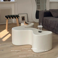 Table basse convertible moderne de luxe avec design ondulé, en bois écologique, pour petits espaces de salon