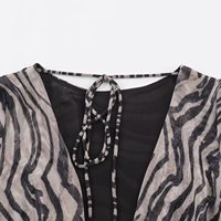 SHENZHU 2026 Nouvelle Robe Femme Tendance Automne Coupe Ajustée Manches Longues Dos Nu Imprimé Animal Col Rond à Nouer 5039846