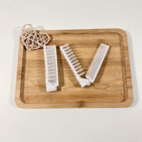 Peigne à cheveux pliable jetable pour hôtel, vente en gros, peigne de voyage compact, commodité pour les clients, hôtellerie, spa, complexe hôtelier
