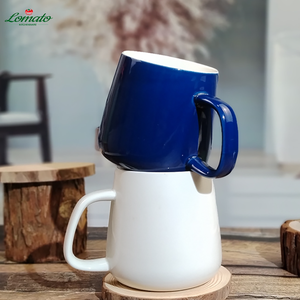 แก้วกาแฟเซรามิคทรงทันสมัย สีขาวล้วน หูจับหนา แก้วอุ่น รับสกรีนโลโก้ แก้วพอร์ซเลนเปล่า ขายส่ง - Product Image 1