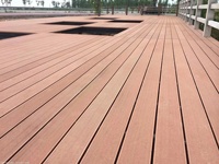 Hochwertiger neuer Holzkunststoff-Verbund deck boden Chinas modernes Außen deck Doppelseitige Schlitz loch platte Wasserdichte Funktion