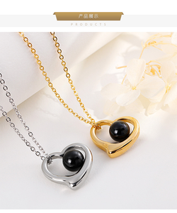Conjunto de collar y pendientes de cuentas negras con forma de corazón hueco para mujer, de alta calidad, estilo retro, ligero, de acero de titanio en tono plateado - Product Image 3