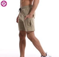 Shorts cargo de sport d'extérieur pour hommes, grande taille, couleur unie, séchage rapide, avec logo personnalisé, pour fitness et course à pied, avec grandes poches