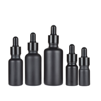 Flacon compte-gouttes en verre noir personnalisé avec bouchons en caoutchouc noir 5ml 10ml 15ml 20ml pour huiles essentielles, sérums et emballages cosmétiques