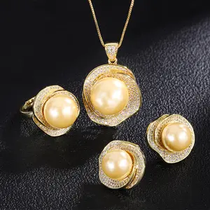 Venta caliente moda clásica oro flor collar anillo pendientes conjunto mejor perla de agua dulce conjunto de joyas