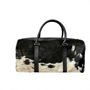 กระเป๋าเดินทางหนังวัวทรงสี่เหลี่ยมผืนผ้าแบบ unisex พร้อมซิปปิด หูหิ้วคู่ ดีไซน์ทันสมัย ความจุ 36-56 ลิตร - Product Image 1