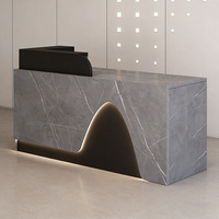 Comptoir de réception moderne et minimaliste avec éclairage LED, finition grain de pierre, pour magasin de vêtements, bureau, commerce de détail, vente en gros