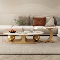 Table basse ovale en pierre légère de style italien, table d'appoint double boule de luxe léger et simple pour la maison, combinaison tendance
