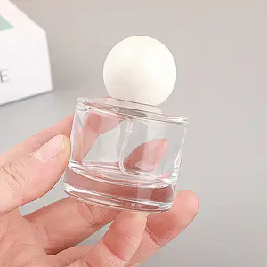 Bouteille en verre de parfum de luxe cosmétique vide rechargeable personnalisée avec bouchon blanc rond de 30ml