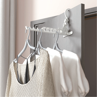 Séchoir à linge portable pliable à 9 trous en plastique pour hôtels, camping et voyages - Cintre de type crochet pour fixation sur porte/mur