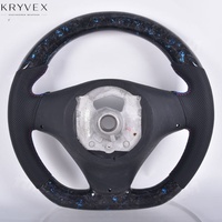 Volant sport Kryvex pour modèles LED en fibre de carbone forgée et cuir, avec couleur et surpiqûres personnalisables