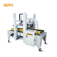 Machine de scellage de cartons électrique entièrement automatique GURKI - Haute efficacité Longue durée de vie Applications pour les boissons et les vêtements
