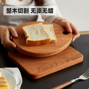 Planche à découper ronde en bois massif, planche à découper de cuisine en bois d'ébène naturel pour fruits et pain, 24x20x2cm - Product Image 1