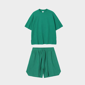 Conjunto de Dos Piezas Unisex de Algodón, Camiseta de Cuello Redondo y Pantalones Cortos con Cintura Elástica, Color Sólido, Corte Holgado, Ropa Casual de Verano - Product Image 4