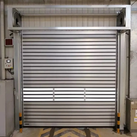Porte électrique isolée ATMOS CE à enroulement rapide, rail en alliage d'aluminium, volet coupe-vent robuste pour entrepôts