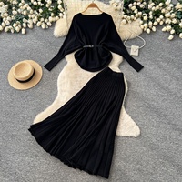 Ensemble deux pièces tricoté haut de gamme style décontracté pour femme, avec haut à manches longues et jupe mi-longue taille haute amincissante, idéal pour l'automne