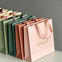Sac fourre-tout robuste de 6 à 9 kg en carton blanc, avec logo personnalisé, texture élégante pour usage commercial haut de gamme