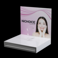 Outil de beauté de comptoir en acrylique personnalisé Masseur facial AD Rack Cosmétique Laser Instrument de beauté Présentoir