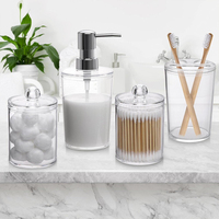 Ensemble d'accessoires de salle de bain en plastique : distributeur de savon, support et organiseur de brosses à dents
