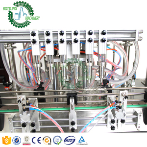 Machine <span class=keywords><strong>de</strong></span> remplissage linéaire pneumatique automatique économique et précise 5000BPH en SUS316L <span class=keywords><strong>pour</strong></span> jus en bouteilles ovales et rondes <span class=keywords><strong>de</strong></span> 500 ml 	 Crème <span class=keywords><strong>de</strong></span> moutarde - Product Image 3