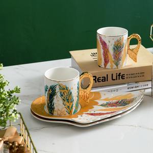 Taza de Cerámica Estilo Europeo con Alas de Ángel Doradas para Desayuno o Té de la Tarde con Plato para Postre - Product Image 3