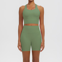 Ensemble de fitness pour femme comprenant un soutien-gorge de sport moulant effet seconde peau avec coussinets et un short de course extérieur à séchage rapide effet push-up