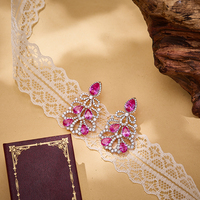 2025 laiton zircone arc entrelacé boucles d'oreilles en forme de poire respectueux de la peau bijoux haut de gamme accessoires pour femmes