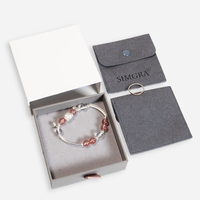 Bolsa de almacenamiento de anillo de pendiente pequeño de microfibra de lujo de alta calidad embalaje textil personalizado para joyería