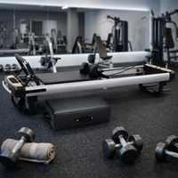 Reformer de Pilates haut de gamme en alliage d'aluminium anodisé avec chariot en bois et glissement silencieux et fluide pour la maison