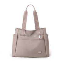 Sac fourre-tout en nylon personnalisé en gros, grande capacité, design simple et élégant, idéal pour les voyages et le shopping, fermeture éclair, pour femme