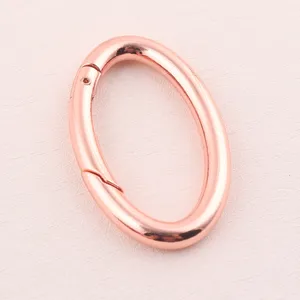 Forma ovale borsetta in metallo porta o anello moschettone per portachiavi cordino