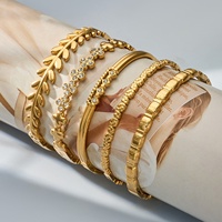 Bracelet jonc en acier inoxydable plaqué or 18 carats, étanche et inaltérable, avec fermoir en forme de feuille et zircon, pour femme