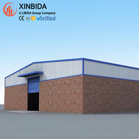 Structures en acier industrielles pour système d'entrepôt préfabriqué, structure à travée libre Q355B avec panneau PU et certifiée CWB pour stockage en vrac