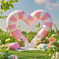 Arche gonflable en forme de coeur rose commerciale pour des événements de mariage annonçant des décorations gonflables