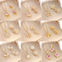 Nouvel ensemble de bijoux pour femmes, collier et boucles d'oreilles en acier inoxydable sans nickel, plaqué or 18 carats, pendentif trèfle cœur en zircon
