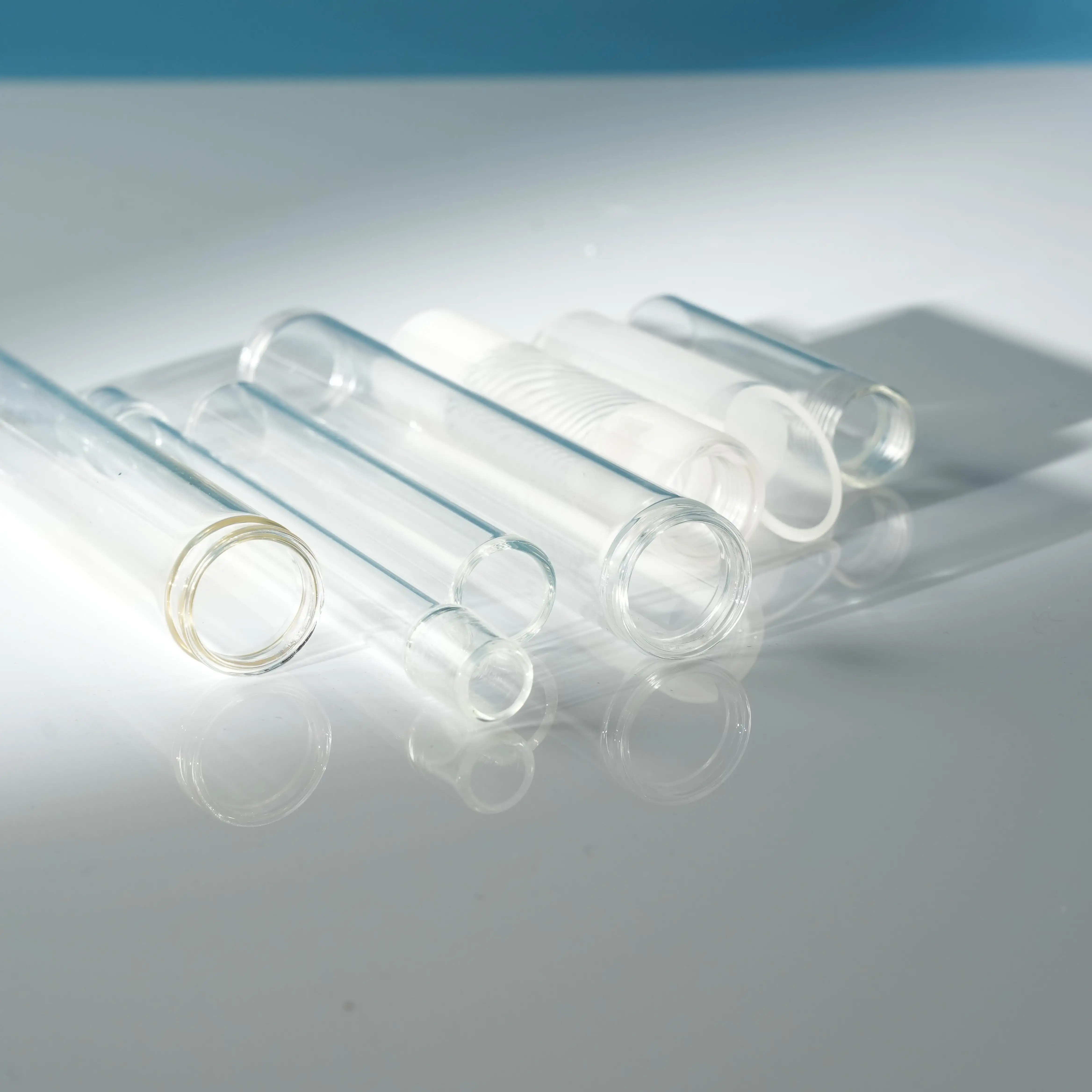 Venta al por mayor de cuarzo de alta pureza superficie lisa y transparente tamaño personalizado tubo de vidrio de borosilicato para portavelas