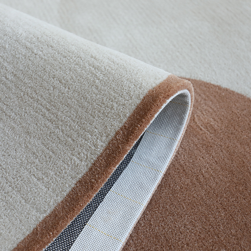 Break away from traditional geometry and transform your floor into a piece of modern art! Featuring an eye-catching, abstract irregular contour, this plush accent rug adds effortless Scandinavian style, soft texture, and dynamic artistic energy to living rooms and cozy lounge corners.  Crafted with high-density, non-shedding fibers and a non-slip backing, it offers ultra-soft underfoot comfort while maintaining its vibrant aesthetic across homes in Bahrain!  Why You’ll Love It: • Eye-Catching Irregular Contour: Unique organic shape creates an instant artistic centerpiece for modern interior spaces. • Ultra-Soft Plush Feel: Soft, high-density pile provides warm, cozy underfoot comfort for relaxing or lounging. • Anti-Slip Protective Backing: Designed with a firm grip base to keep the rug securely in place on tile or hardwood floors. • Durable & Non-Shedding: Engineered with resilient, low-maintenance fibers that resist daily wear and tear. • Versatile Accent Placement: Perfect for styling under coffee tables, beside bedroom beds, or in reading nooks. - View 5