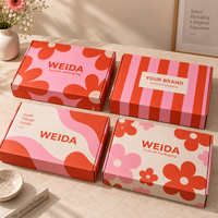Boîte d'expédition rectangulaire pliable en carton imprimé avec motif floral rose et orange, logo personnalisé, pour emballage de marque en gros