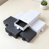 Boîte de rangement pour bijoux en carton noir écologique réutilisable avec fermeture magnétique, finition vernie imprimée en feuille d'or