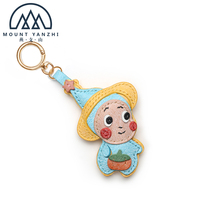 Porte-clés léger et portable en cuir véritable avec anneau métallique, logo personnalisé de haute qualité, breloque de sac mignonne et amusante, modèle Yanzhi
